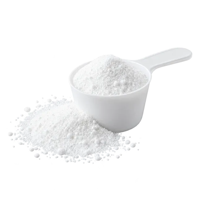 A white measuring scoop filled with laundry powder on a red background: the product is dangerous to dogs and cats.